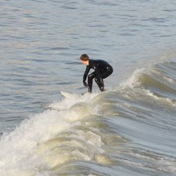 Man surfing in sea