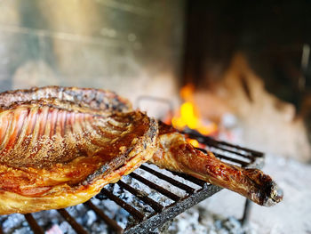 Close-up of meat on barbecue grill