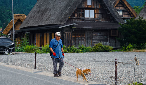 Man with dog in shirakawa
