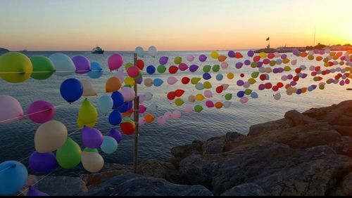 Colorful umbrellas against clear sky