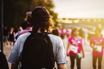 Rear view of woman standing in park