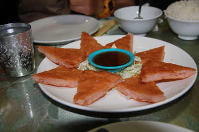 Close-up of breakfast served on table