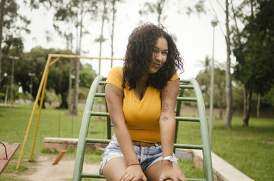 Woman sitting in park