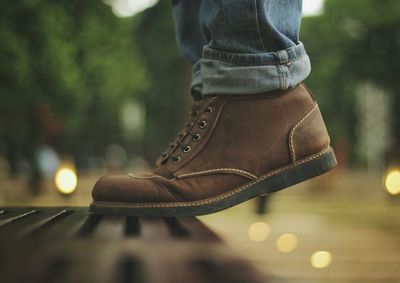 Low section of woman standing outdoors