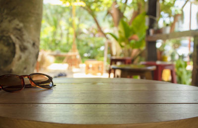 Close-up of sunglasses on table