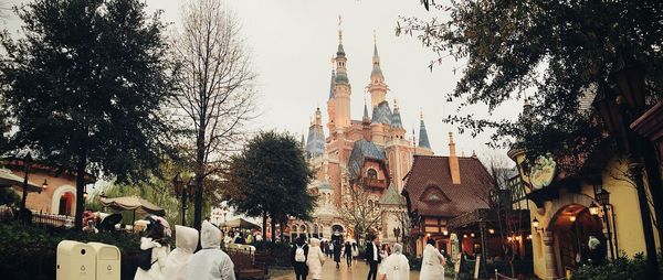 Group of people in temple against building