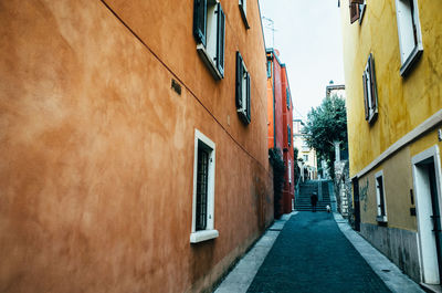 Narrow alley along buildings