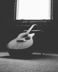 Close-up of guitar at home