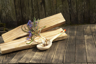 Close-up of open book on wooden table