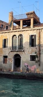 View of old building by canal