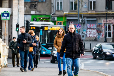 People on street in city