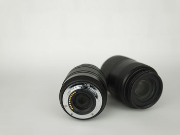 Close-up of camera against white background