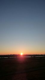 Scenic view of landscape at sunset