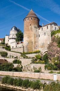 Low angle view of old ruins against sky