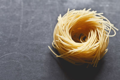 Close-up of yellow pasta on table