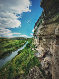 Idyllic landscape with raut river flowing through the canyon hills, karst cliffs at orheiul vechi