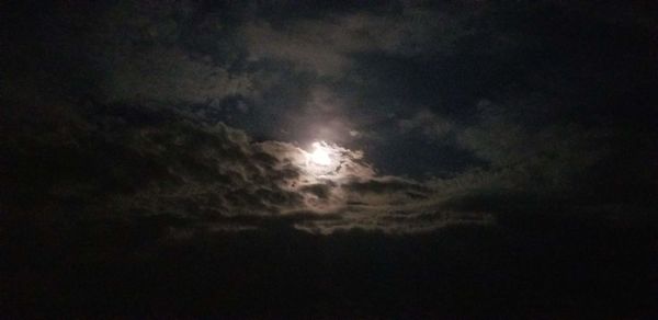 Low angle view of clouds in sky at night