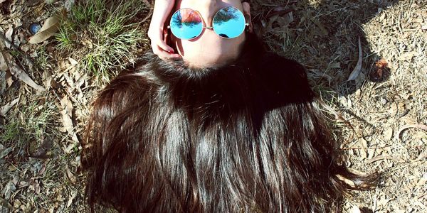 Portrait of woman wearing sunglasses