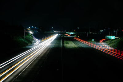 Light trails on city street at night