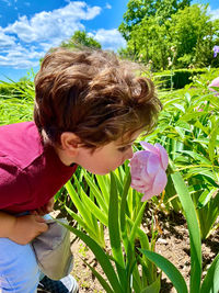 Stopping to smell the pink flowering plants