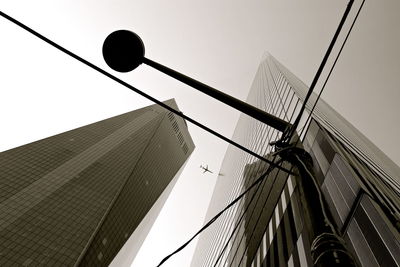 Low angle view of skyscraper against clear sky