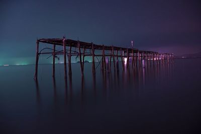 Scenic view of sea against sky at night