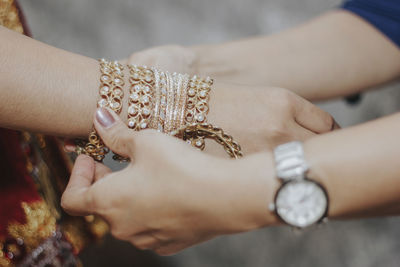 Close-up of hand holding hands