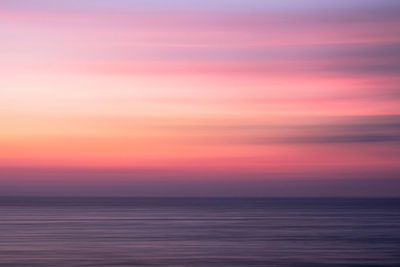 Panoramic view of sea against sky during sunset