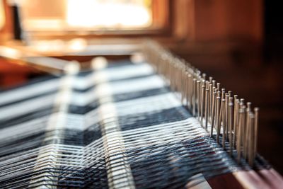 Close-up of piano keys in building