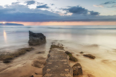 Scenic view of sea against sky during sunset