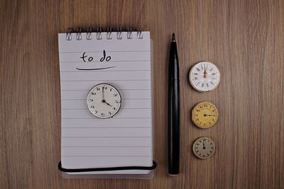 Close-up of clock on table