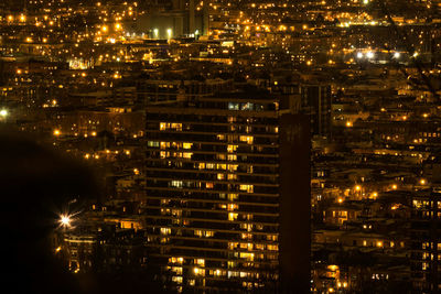 Illuminated cityscape at night