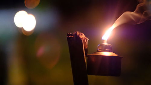 Close-up of burning candle