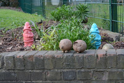 Statue of bird on plant