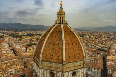 High angle view of cathedral against cloudy sky