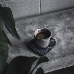 High angle view of coffee cup on table