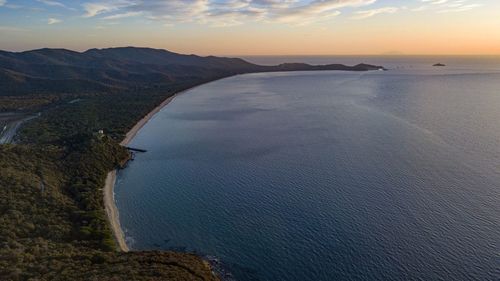 High angle view of sea against sky during sunset