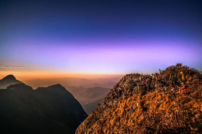 Scenic view of mountains against sky during sunset