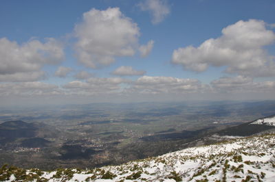 Scenic view of snowcapped mountains against sky