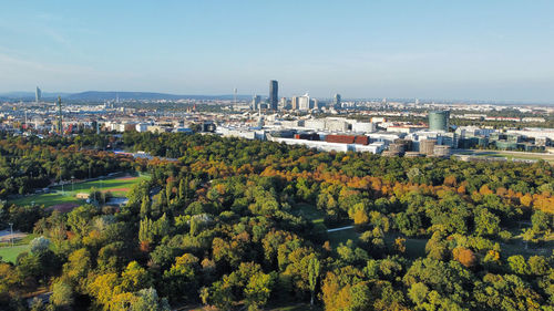 High angle view of trees and buildings against sky