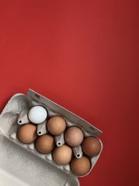 Close-up of candies against red background