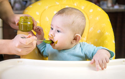 Close-up of boy eating food