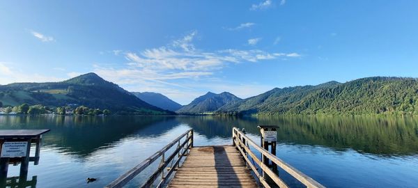 Pier over lake against sky