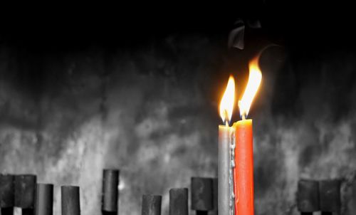 Close-up of burning candles