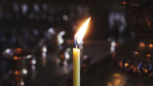 Close-up of illuminated candles