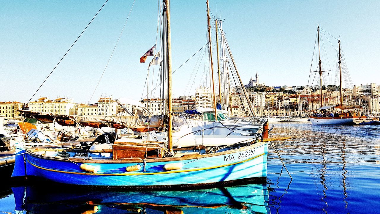 SAILBOATS IN HARBOR