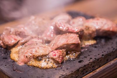 Close-up of meat on barbecue grill