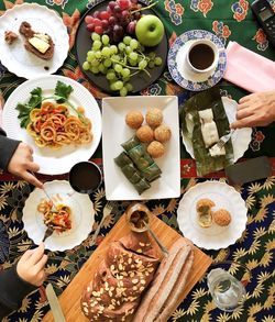 High angle view of person preparing food on table