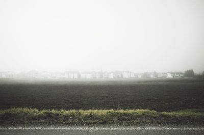 View of field against clear sky