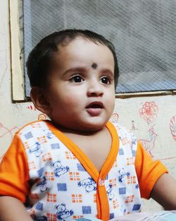 Portrait of cute boy at home